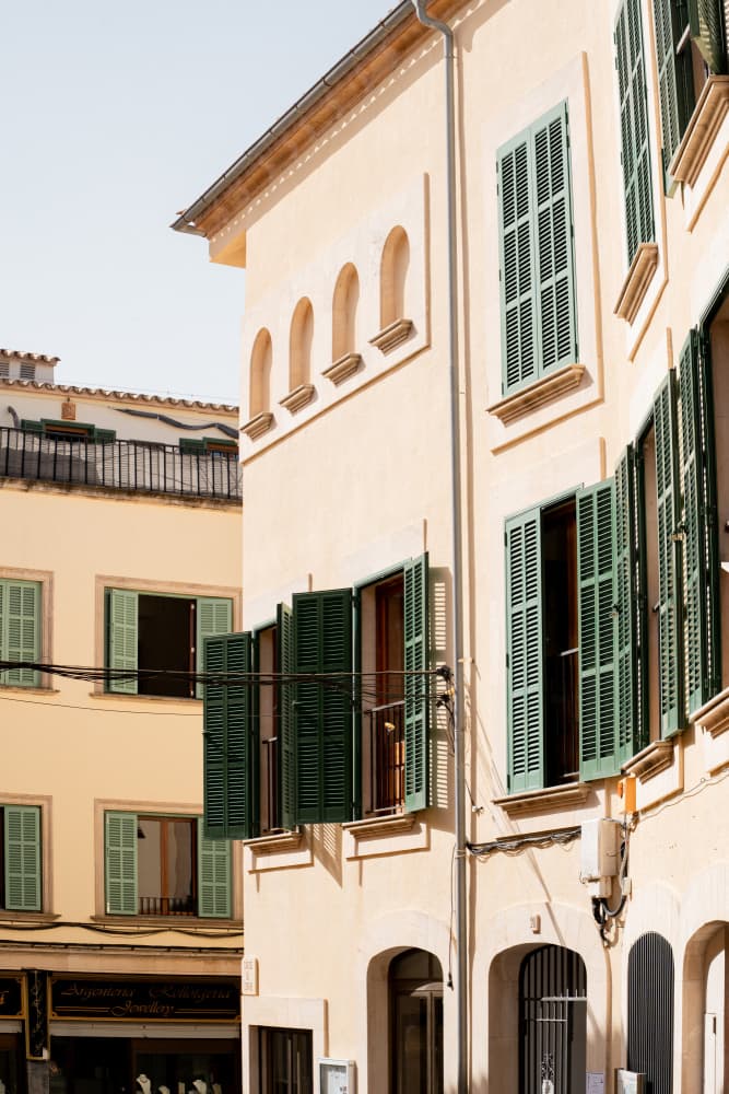 Sunlit Green Shutters by Henrike Schenk — canvas wall art