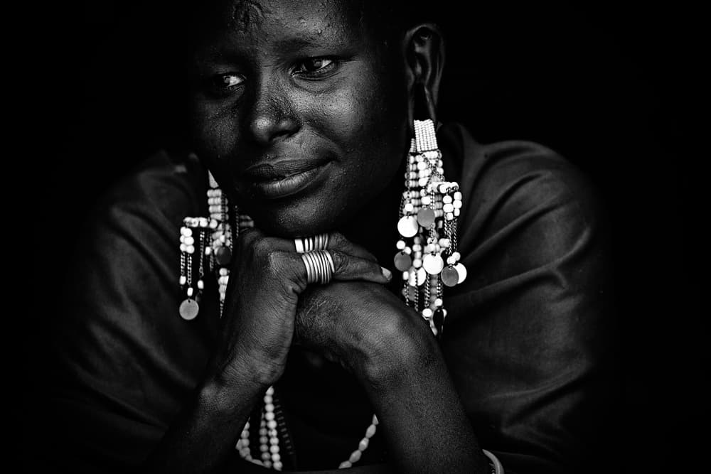 Contemplative Maasai Woman by Vedran Vidak — canvas wall art