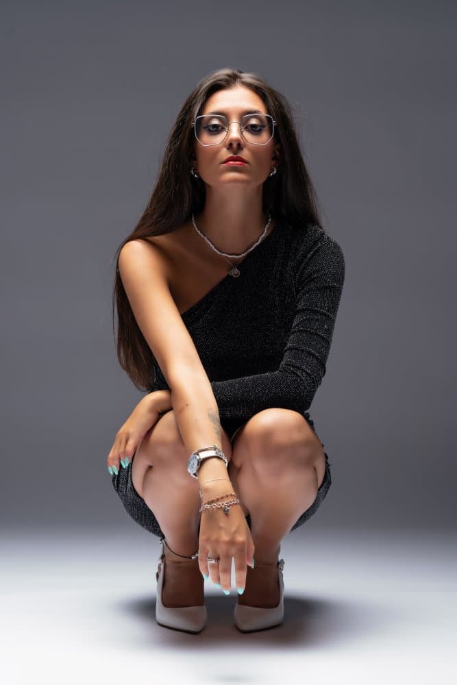 Confident Woman in Glasses by Domenico Petrocca — canvas wall art