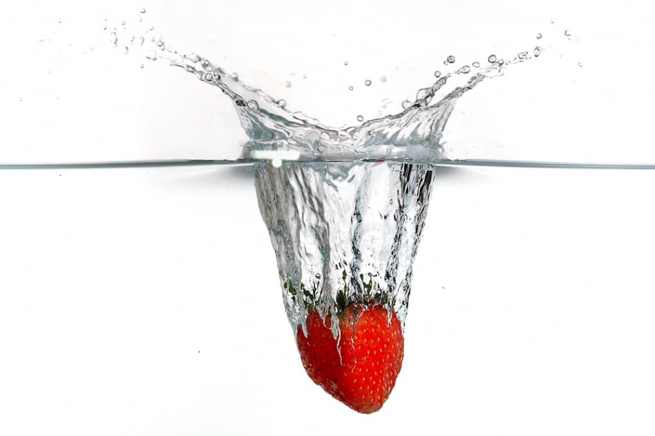 Fresh Strawberry Splash by Taufik Zamzami — canvas wall art