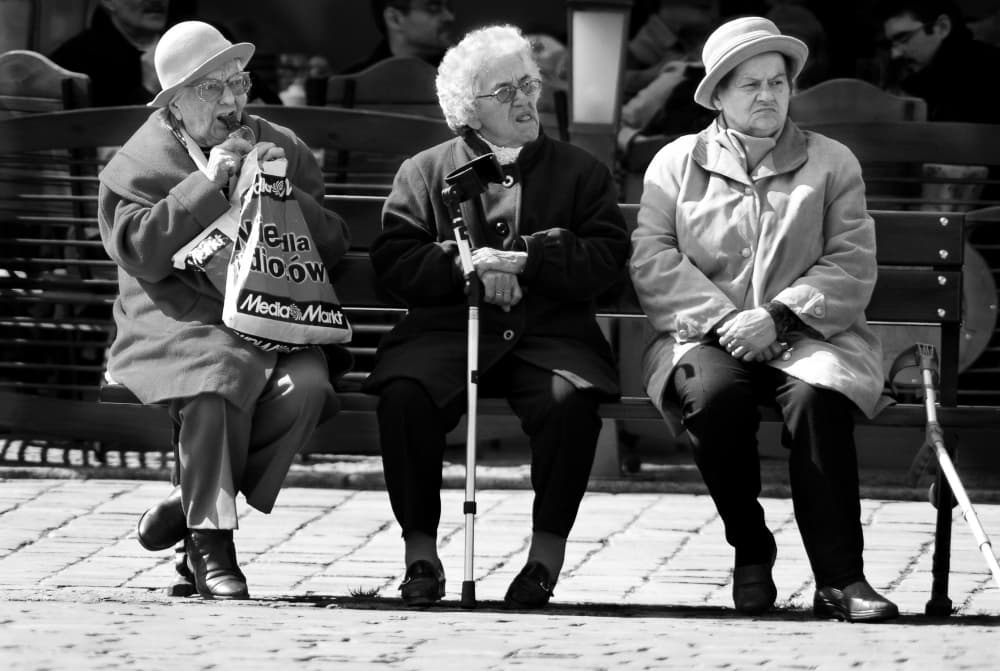 Seniors on a Bench by Jacek Stefan — canvas wall art