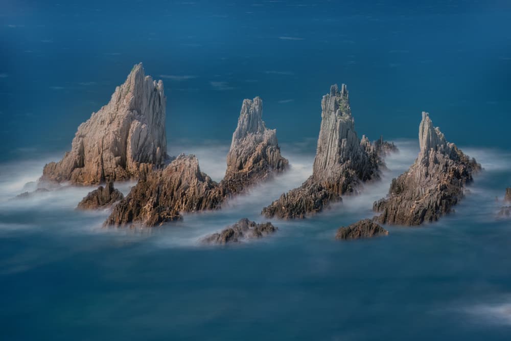 Misty Sea Stacks by Yuan Su — canvas wall art