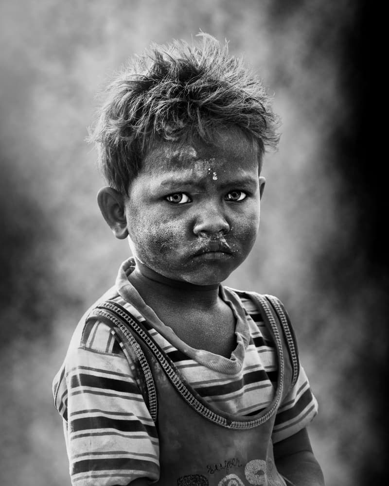 Intense Young Boy by JOYRAJ SAMANTA — canvas wall art