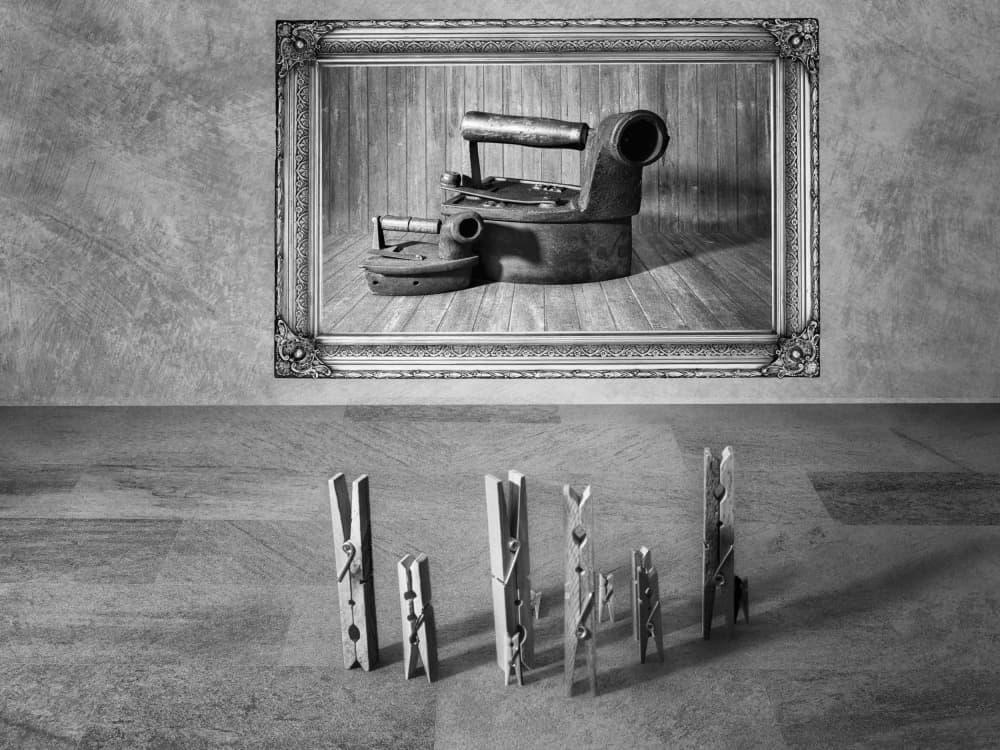 Antique Irons Clothespins by Montserrat Alviani — canvas wall art