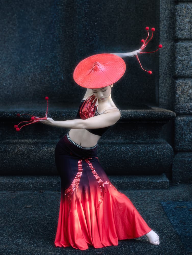 Graceful Red Hat Dancer by Yanny Liu — canvas wall art