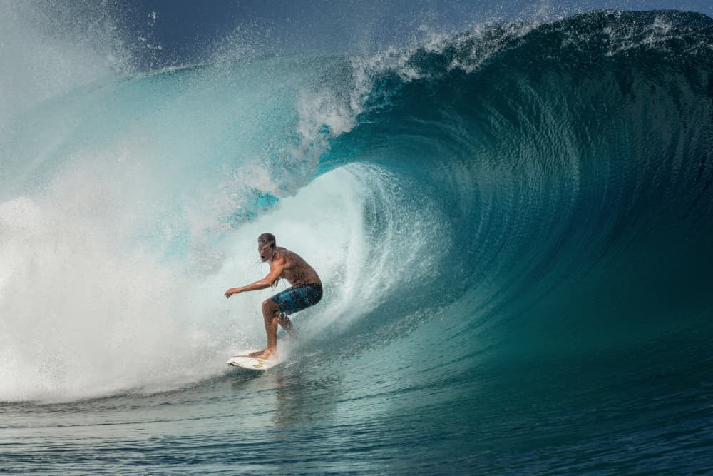 Surfer In The Tube by Mathilde Guillemot — canvas wall art