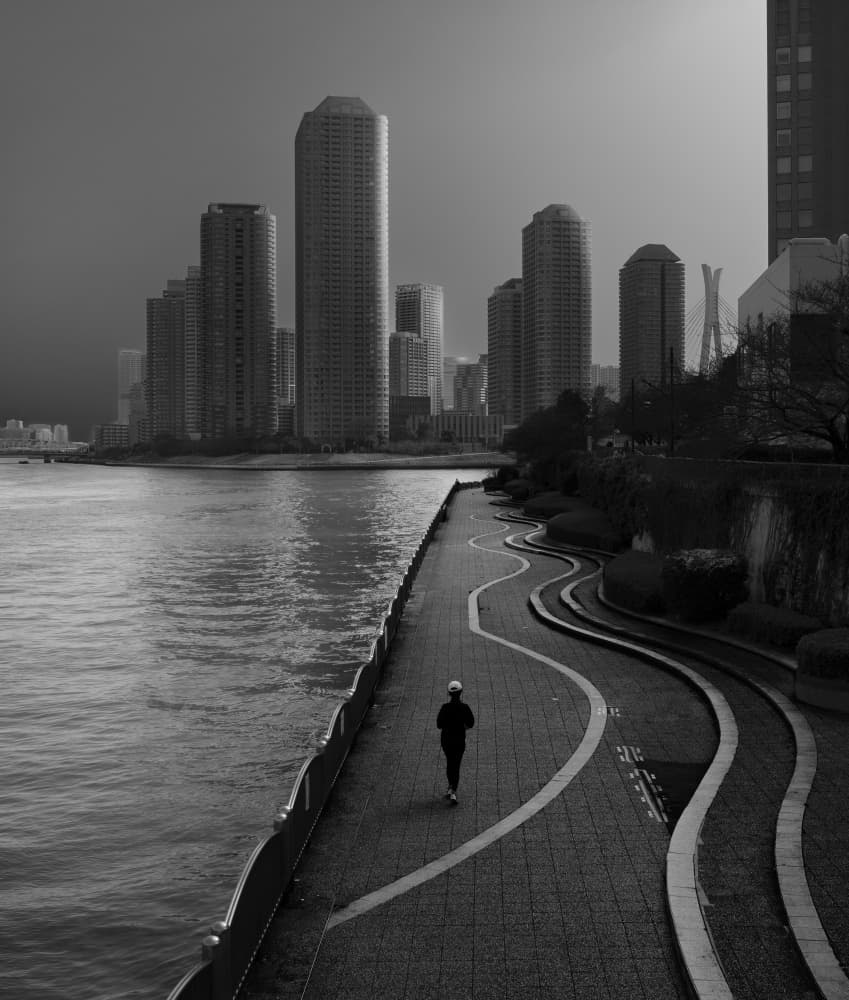 Solitary Riverside Runner by Yasuhiro Takachi — canvas wall art