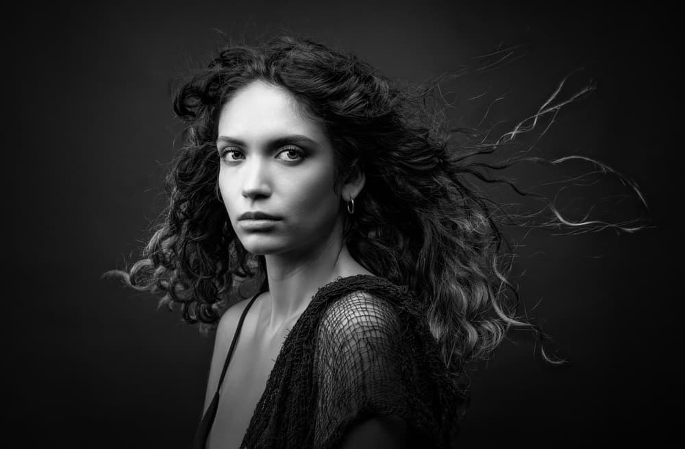 Intense Gaze Woman by Luc Stalmans — canvas wall art