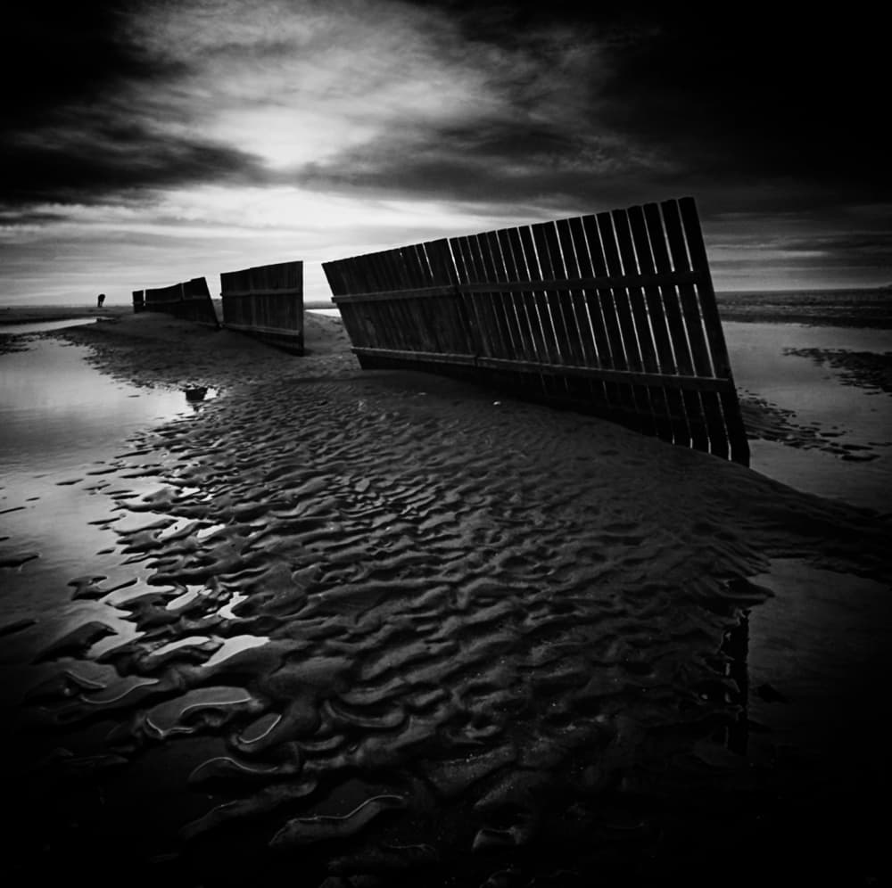 Moody Coastal Fences by Juan Marín Gómez — canvas wall art