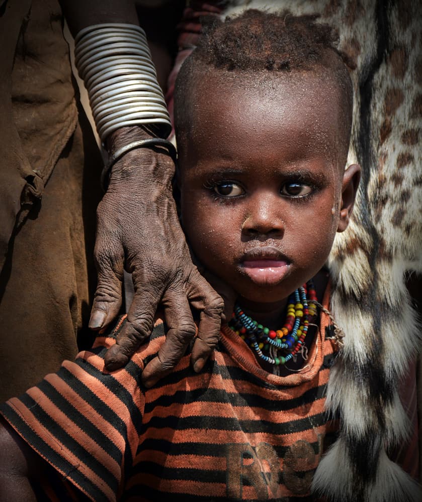 Tribal Child's Gaze by Irene Perovich — canvas wall art