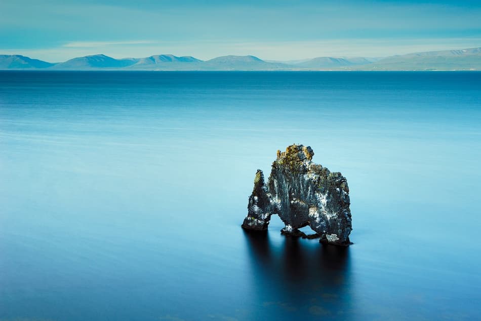 Calm Blue Sea Stack by Luigi Ruoppolo — canvas wall art
