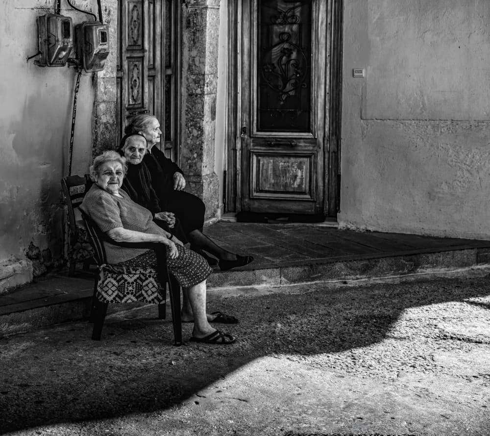 Three Women Quiet Street by Ömer Ates Kızıltug — canvas wall art