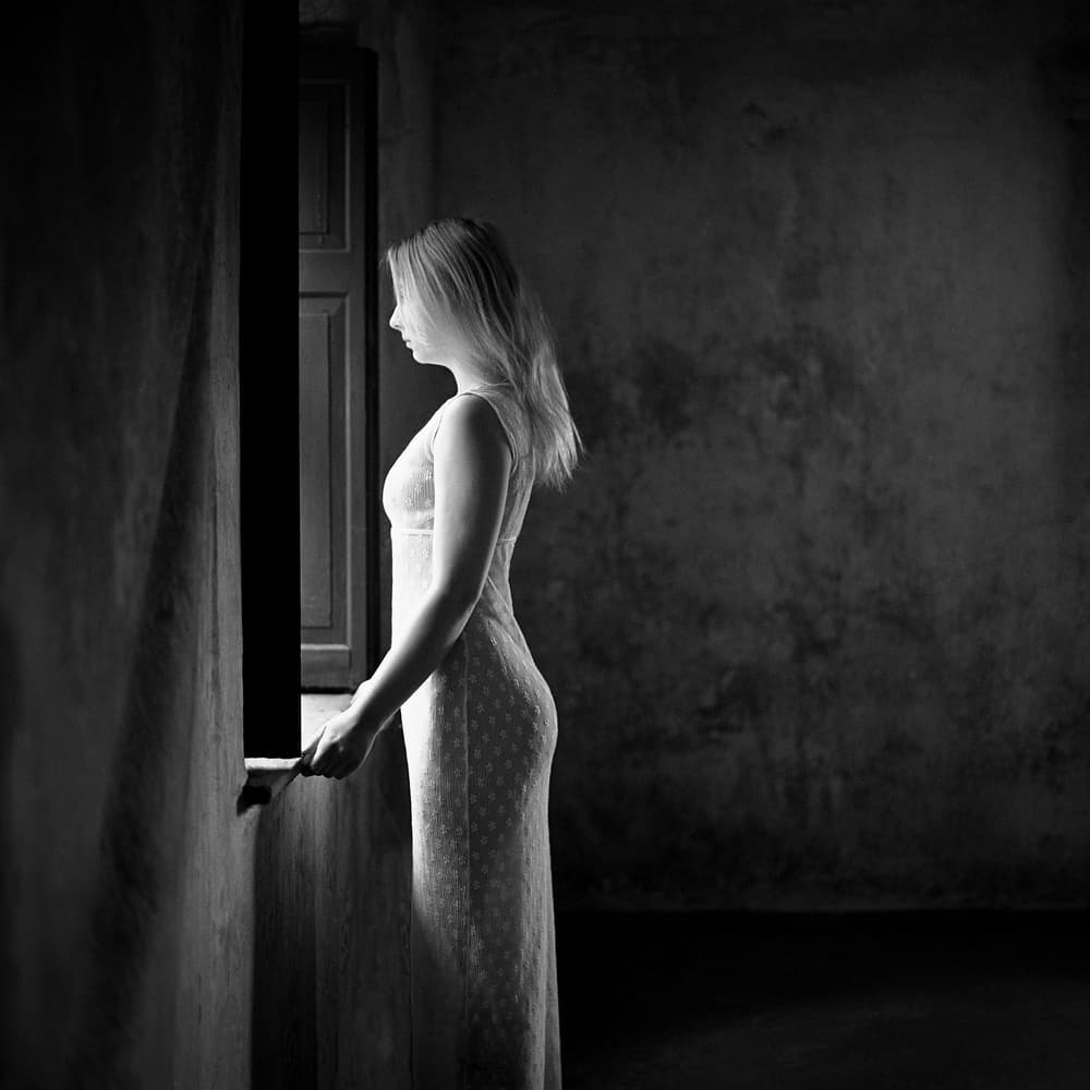 Pensive Woman By Window by Rafał Kaźmierczak — canvas wall art