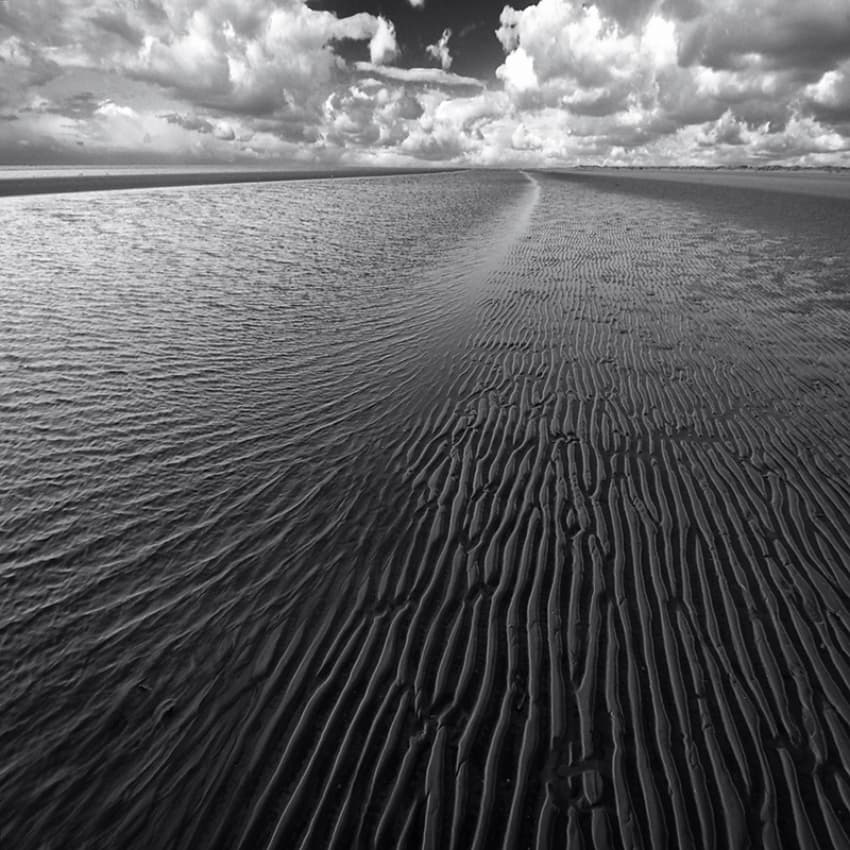 Rippled Sand And Sky by Carsten Meyerdierks — canvas wall art