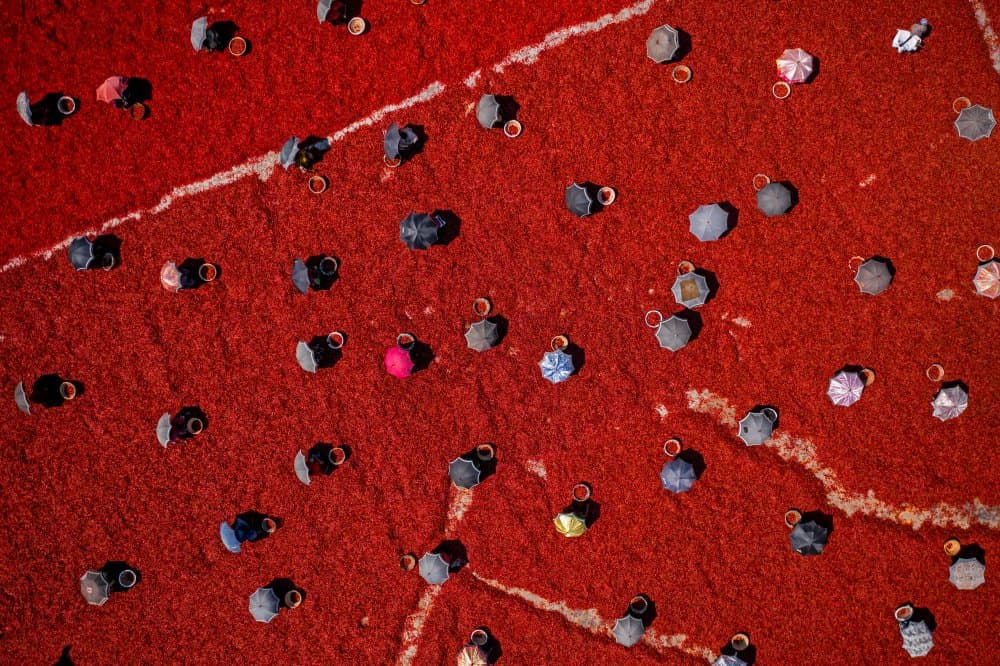 Aerial Umbrellas on Red by Azim Khan Ronnie — canvas wall art