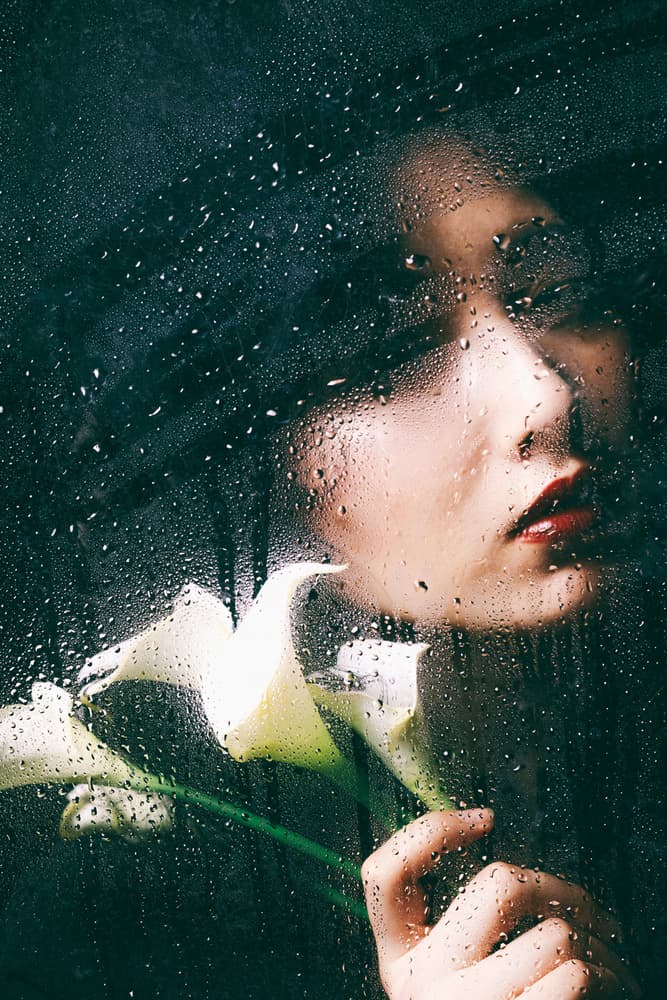 Pensive Woman Rainy Glass by Daisuke Kiyota — canvas wall art