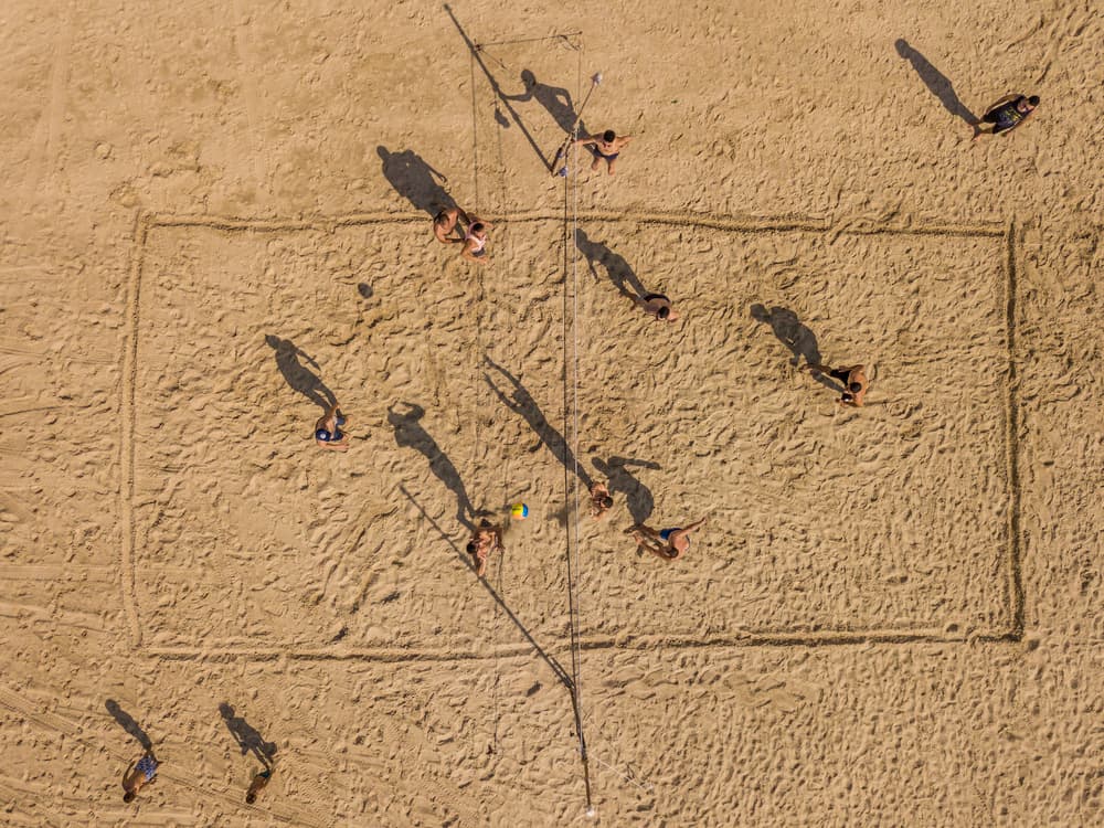 Beach Volleyball Game by Or Adar — canvas wall art
