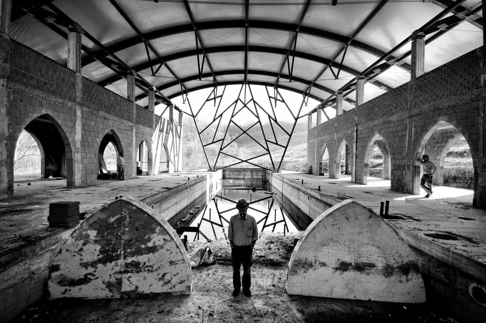 Man in Geometric Hall by Carlo Ferrara — canvas wall art