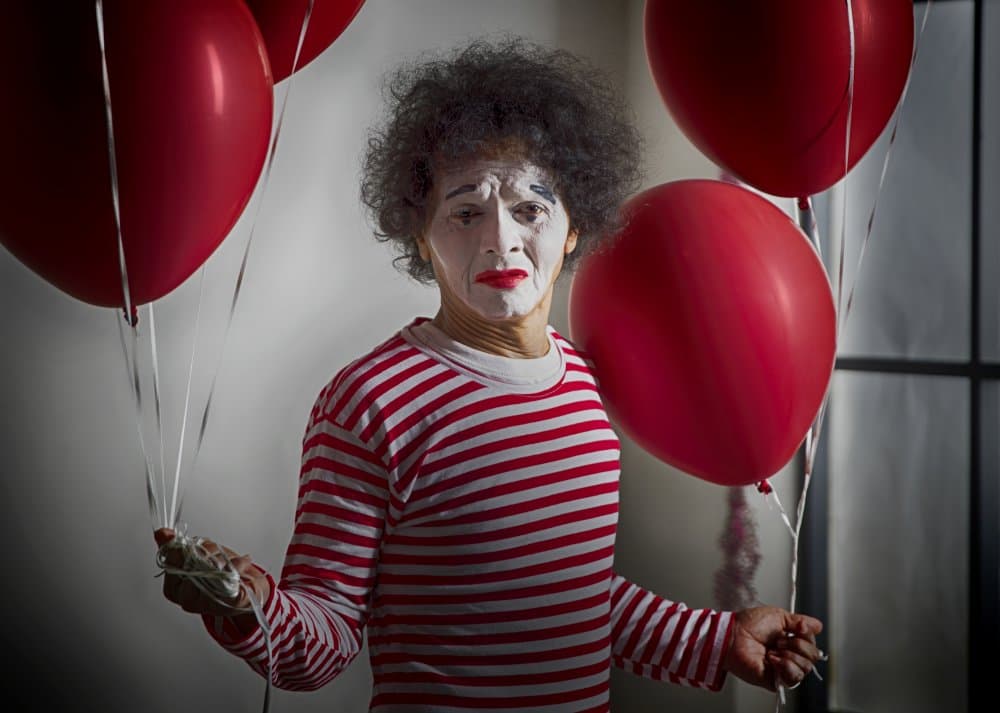 Sad Clown with Balloons by Angela Muliani Hartojo — canvas wall art