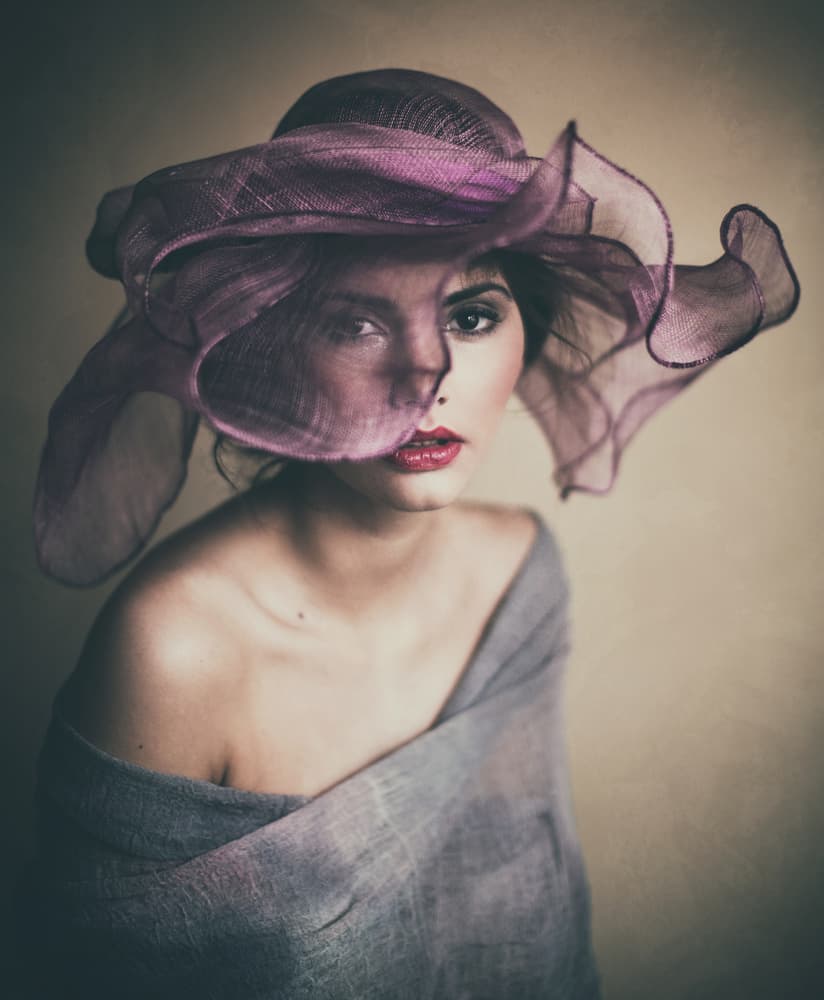 Enigmatic Purple Hat by Magdalena Russocka — canvas wall art