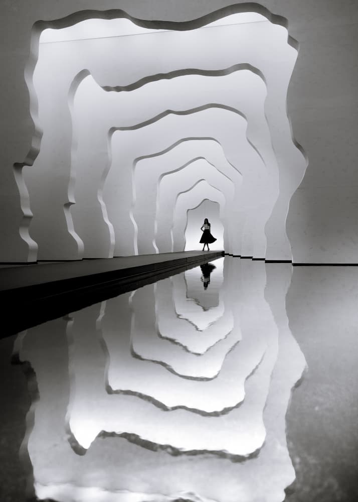 Elegant Woman Tunnel Reflection by Marco Tagliarino — canvas wall art