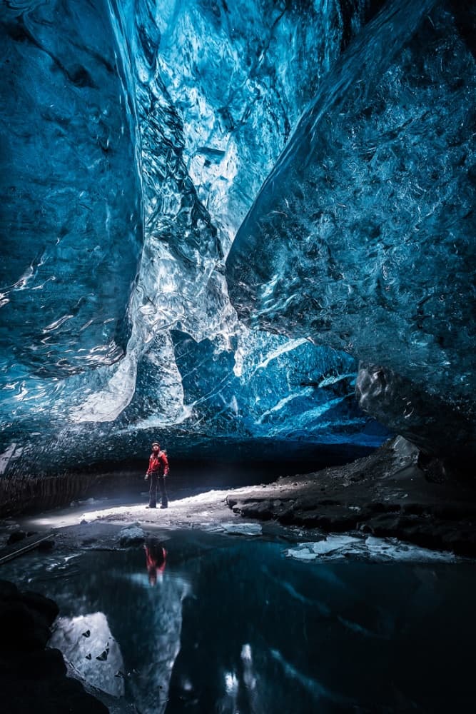 Blue Ice Cave Adventure by Hervé Loire — canvas wall art