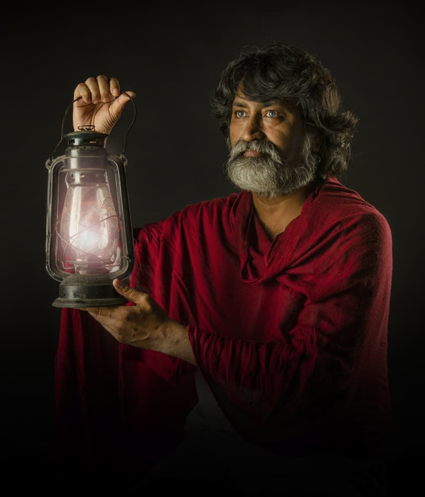 Elder with Lantern by PARTHA BHATTACHARYYA — canvas wall art