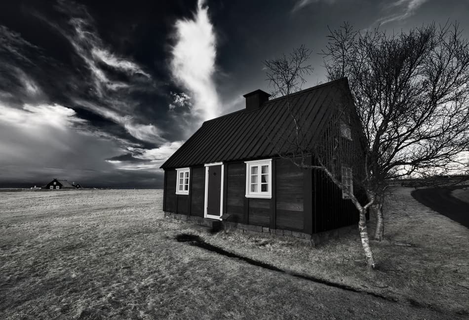 Lonely Cabin Under Dramatic Sky by Bragi Ingibergsson - BRIN — canvas wall art