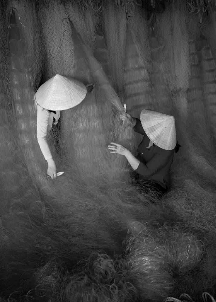 Vietnamese Net Weavers by ADIREK M — canvas wall art