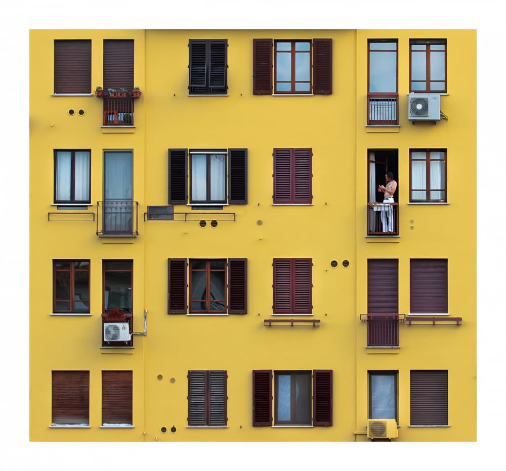Man on Yellow Balcony by Karim Al Thahaby — canvas wall art