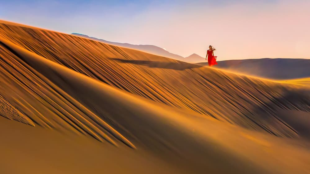 Red Dress Desert Journey by John J. Chen — canvas wall art