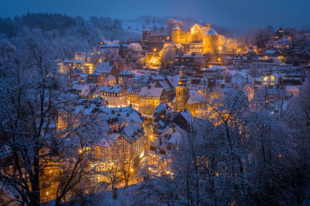Magical Snowy Town by Adrian Popan — canvas wall art