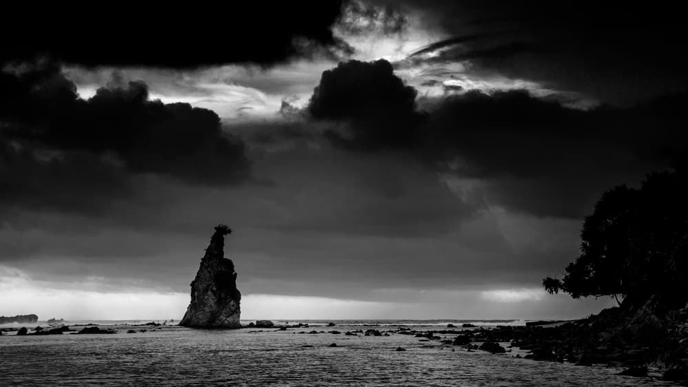 Dark Coastal Rock Formation by Johanes Januar — canvas wall art