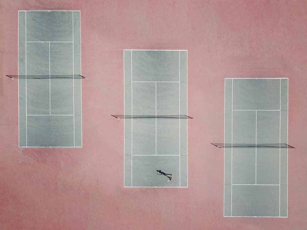 Pink Tennis Courts Overhead by Felix Tchvertkin — canvas wall art