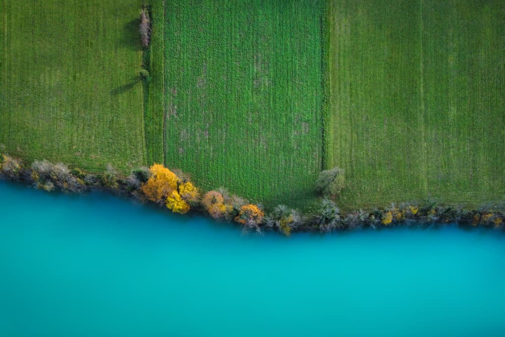 Turquoise Water Green Fields by Primož Kožuh — canvas wall art