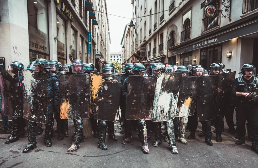 Painted Riot Police by Ronan Siri — canvas wall art
