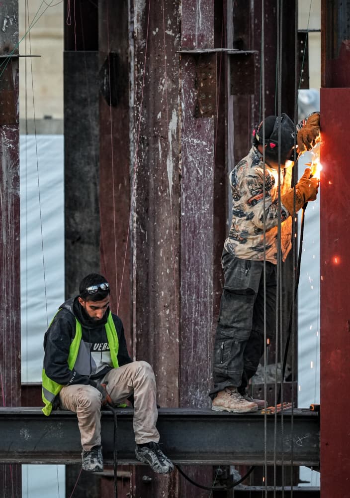 Industrial Welders At Work by Bashar Alsofey — canvas wall art