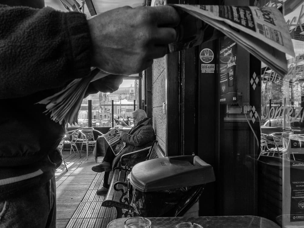 Urban Cafe Reading by Riccardo Lucidi — canvas wall art