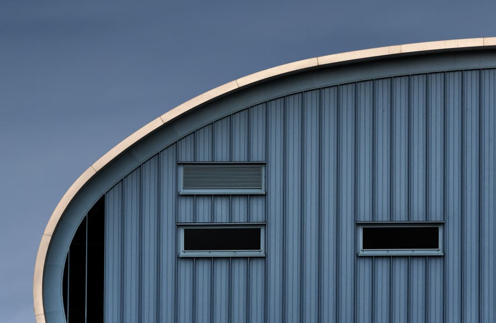 Sleek Blue Architecture by Jef Van den Houte — canvas wall art