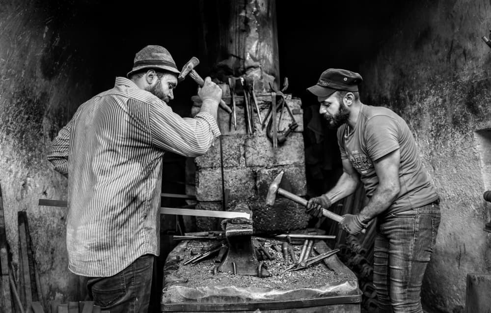 Craftsmen of the Forge by Bashar Alsofey — canvas wall art