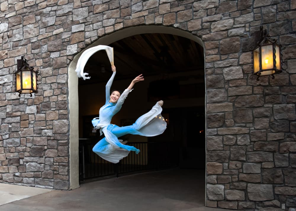 Leaping Dancer in Archway by Ken Liang — canvas wall art