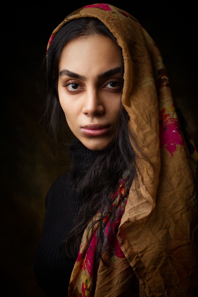 Pensive Woman With Scarf by Mehdi Mokhtari — canvas wall art