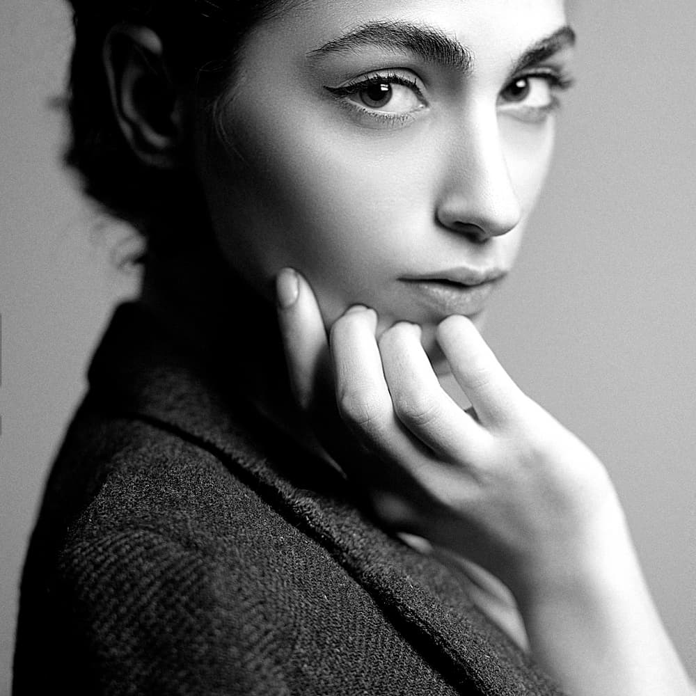 Thoughtful Woman Portrait by Amin Hamidnezhad — canvas wall art