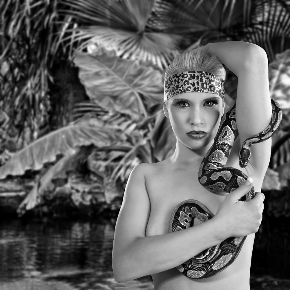 Exotic Woman and Python by Angéla Vicedomini — canvas wall art