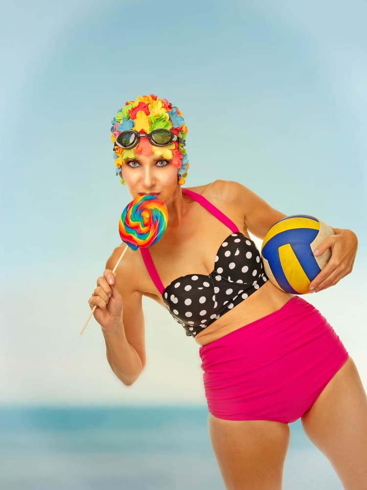 Playful Beach Woman by Klaus Tutsch — canvas wall art