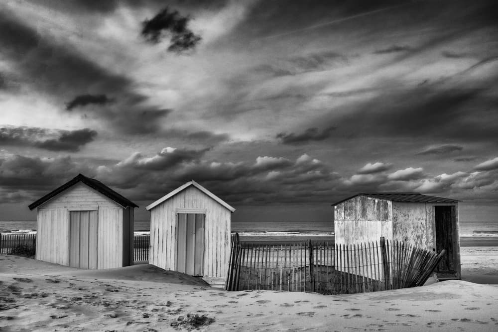 Weathered Beach Huts by Stéphane Pecqueux — canvas wall art