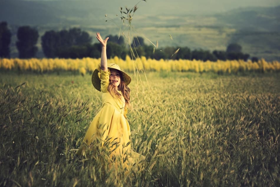 Happy Girl Golden Field by Elena Karagyozova — canvas wall art