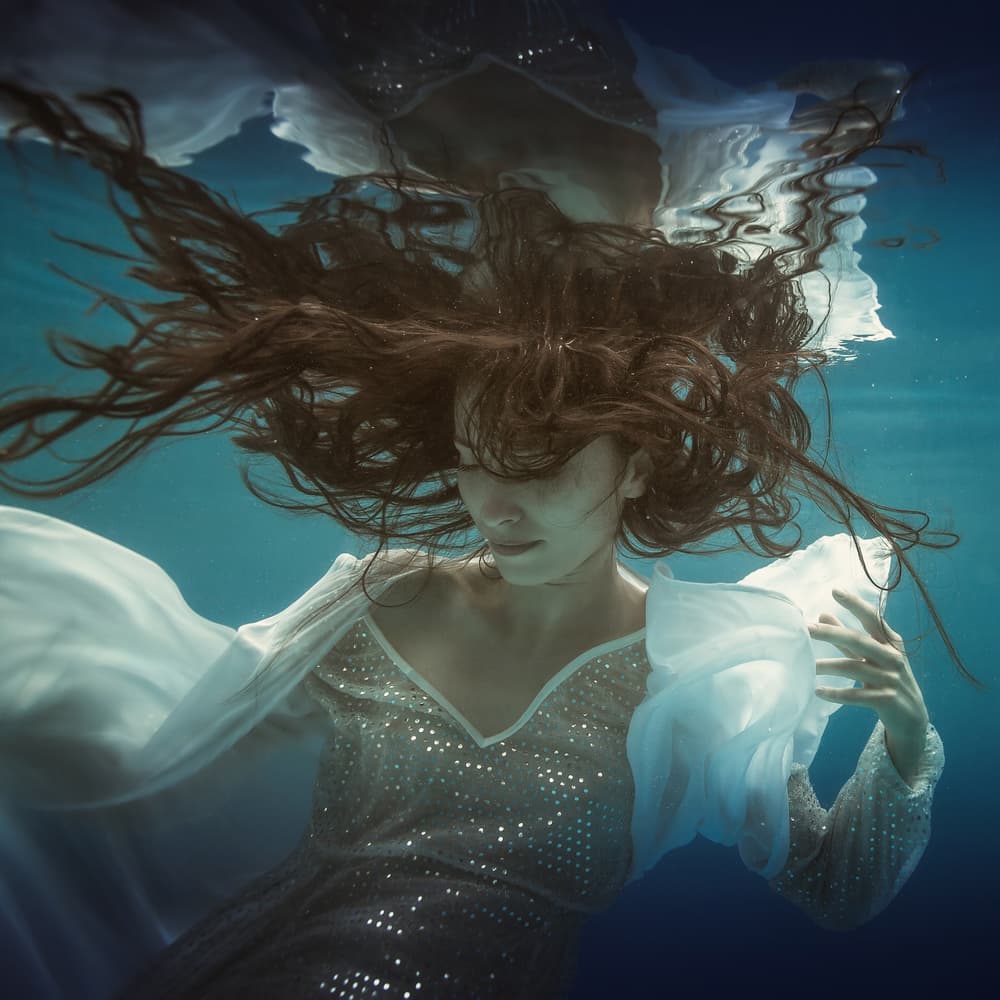 Serene Underwater Woman by Dmitry Frizel — canvas wall art