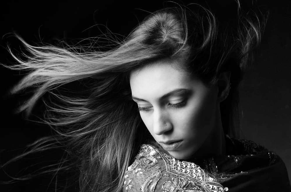 Flowing Hair Pensive Woman by Mehdi Mokhtari — canvas wall art