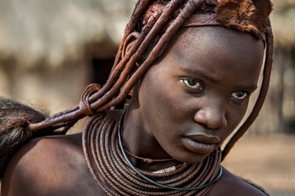 Young Himba Gaze by Piet Flour — canvas wall art